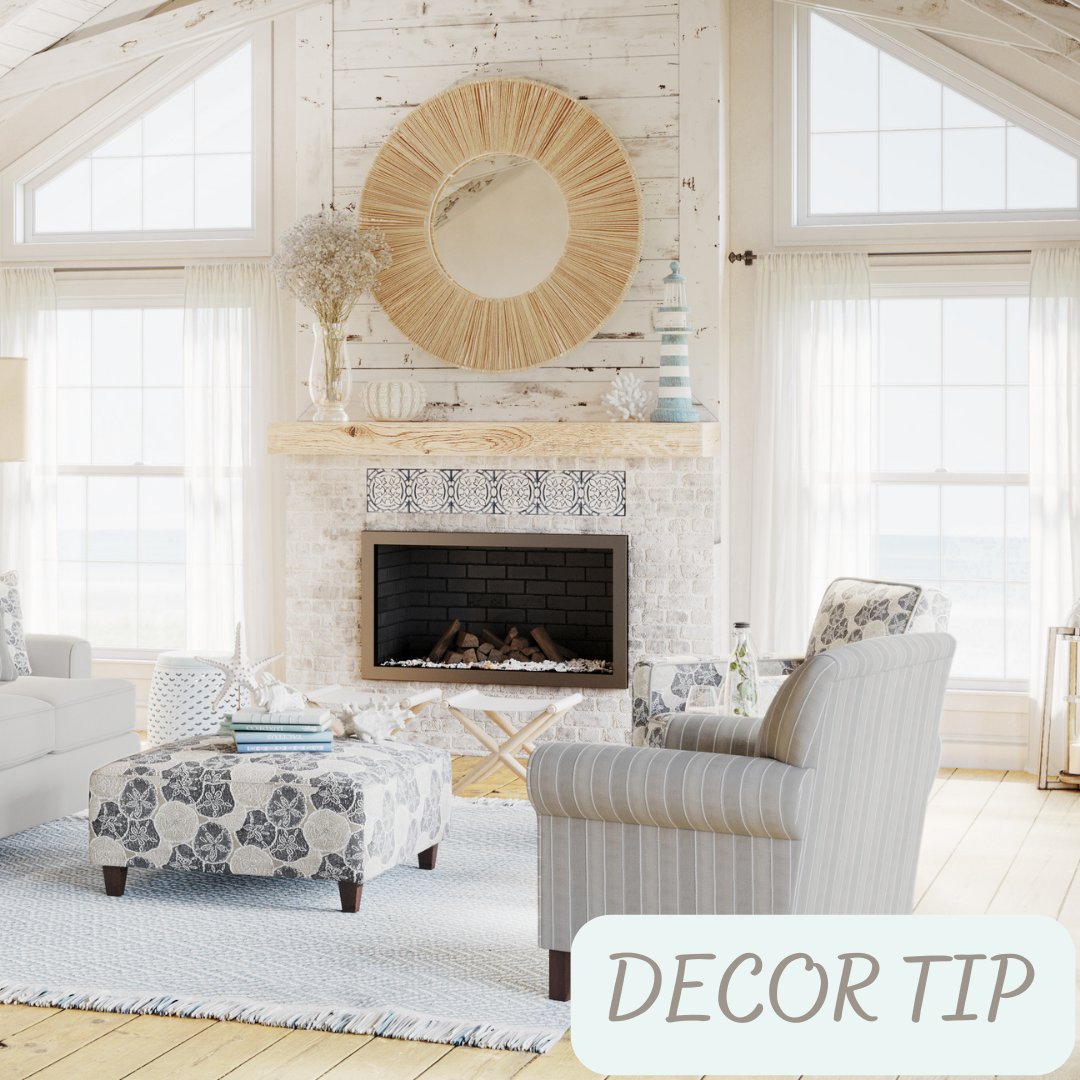 A round mirror positioned above a mantel draws attention to the center of the room without taking away from the fireplace itself.