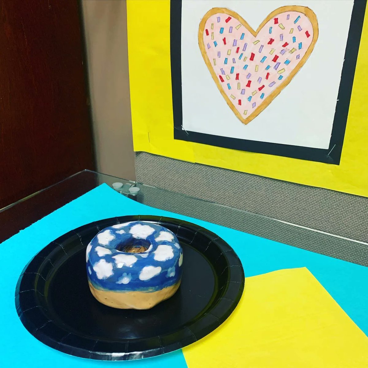 NtlPortfolioDay's tweet photo. We love seeing how art teachers display their students' work! Thank you for sharing @create.with.color (on IG) 🍩 🌈 💙 #artteachers #middleschoolartteacher #middleschoolart #artclass #artlessons #ceramics #clay #ceramicdonut #donuts #donut #studentart https://t.co/aaOiVqt6VK