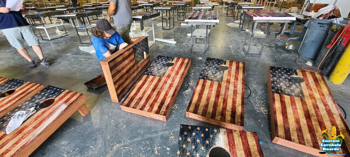 CornholeUSA's tweet image. Cayden busy attaching the carry handles to all the US flag boards we made and shipped today, you can tell July 4th is just around the corner. #corhnhole #4thJulyWeekend