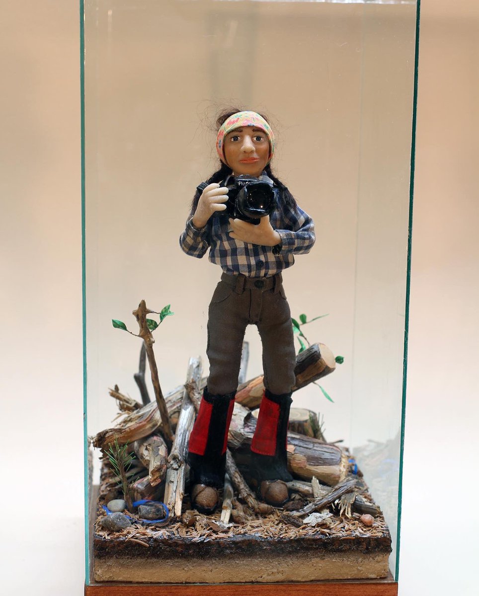 fftt_earth's tweet photo. Here is a diorama of Rita as “photographer of tree planters” by the artist-tree planter Toby Pikelin on display as a part of THE TREE PLANTERS at The Two Rivers Gallery in Prince George, BC. https://t.co/Rk9awlUFgr