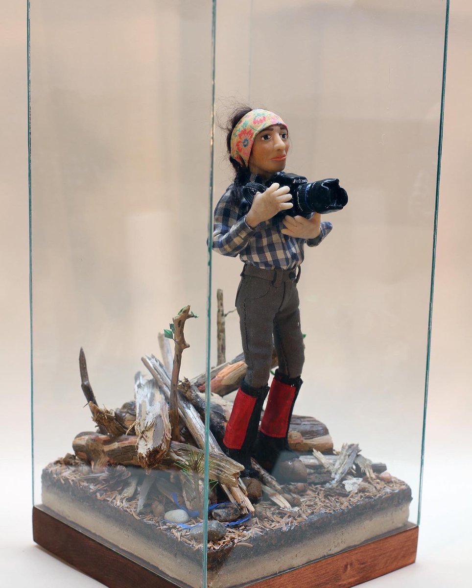 fftt_earth's tweet photo. Here is a diorama of Rita as “photographer of tree planters” by the artist-tree planter Toby Pikelin on display as a part of THE TREE PLANTERS at The Two Rivers Gallery in Prince George, BC. https://t.co/Rk9awlUFgr