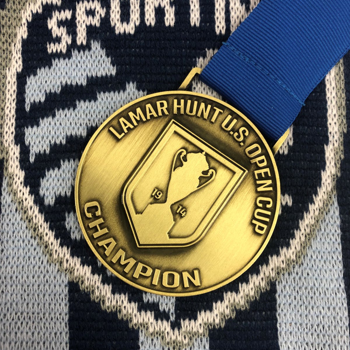 SportingKCSTM's tweet image. STMs, look what we found! 

With #SportingKC hosting NY Red Bull on Sunday, we're giving away a Champions medal from when these 2 teams met in the 2017 US Open Cup Final! 

To be eligible, you must be an SKC STM, follow @SportingKCSTM, &amp;amp; RT this post. #SportingBlueForLife