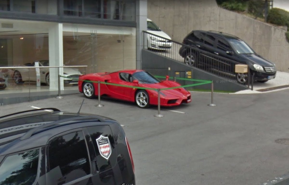 Cars_SV's tweet photo. Possibly my craziest find to date, this stunning Ferrari Enzo on display outside an Aston Martin dealership in Cannes, France - June 2015 #StreetViewCars #SV_Hypercars https://t.co/Yjklwi3rc0