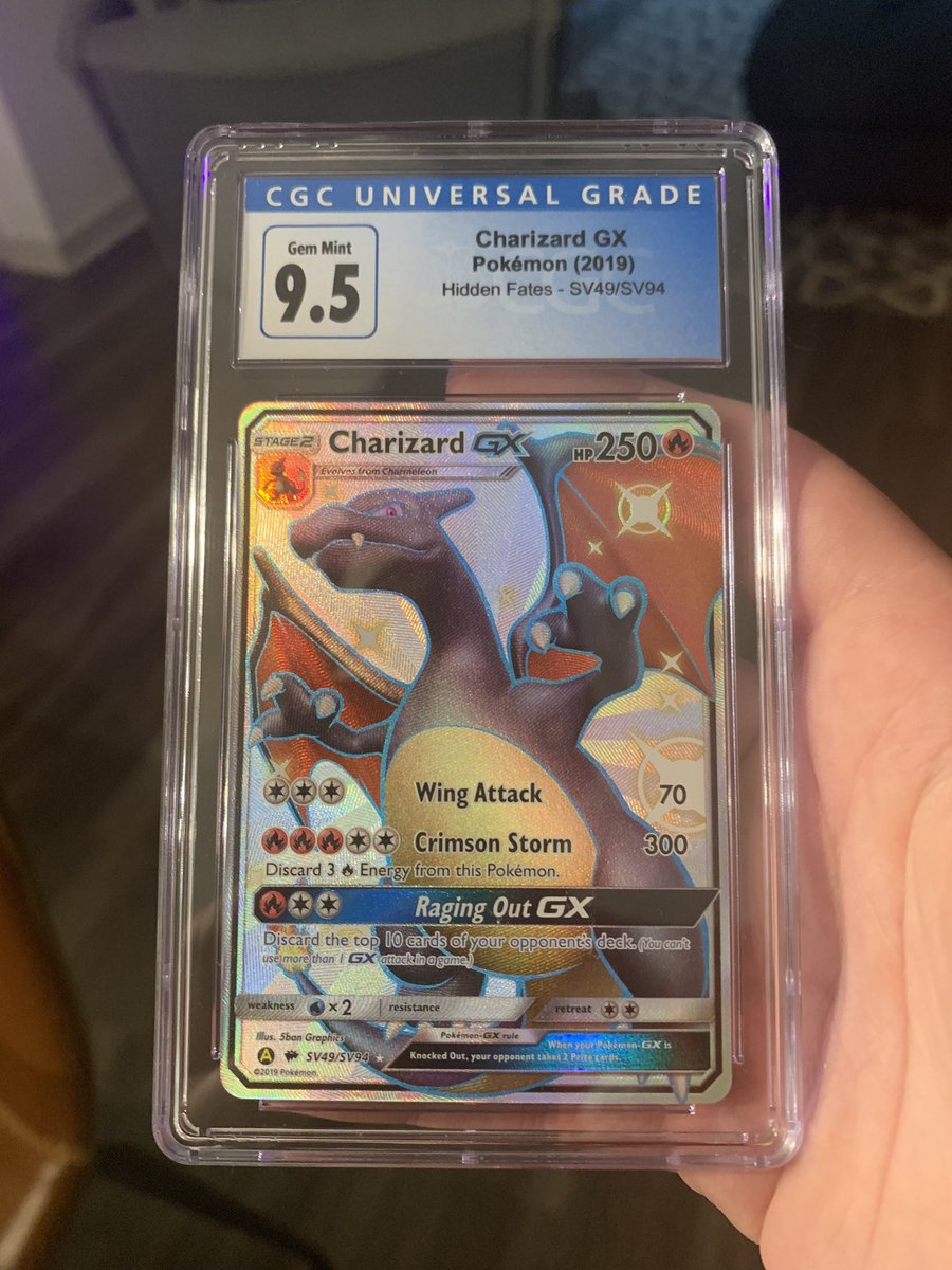 duckybtw's tweet photo. After pulling this Charizard from a pack on stream over a year ago, I finally got it back from being graded and I couldn’t be happier 🥹 https://t.co/mbiR3FYwGO
