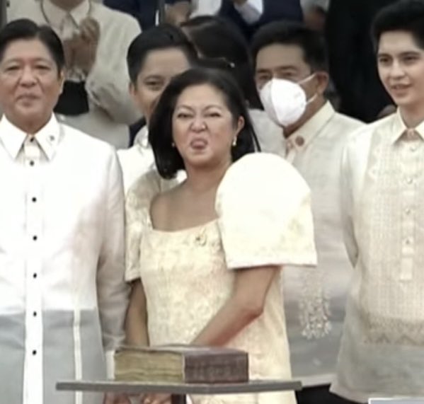 Her face says it all. What’s happening today is a big “belat” to the country