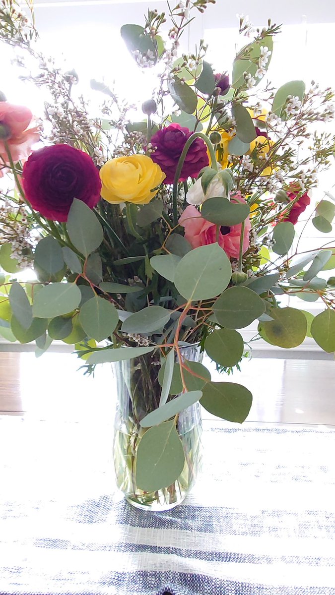 Abstractmind007's tweet photo. A flower arrangement that I had made. this photo was taken with the Google pixel four XL I really like call simple but yet vibrant colors come out in the flowers and then of course the beautiful green on the eucalyptus https://t.co/EBdcvpPcQj