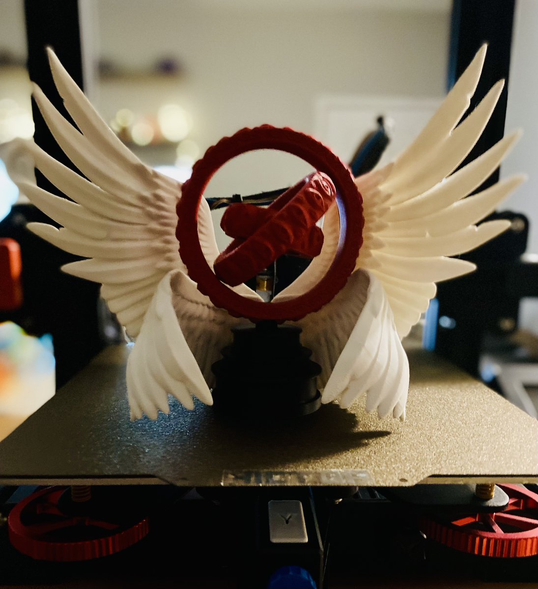 HivTinker's tweet photo. Ophanim Angel v2 by @thekawna my mini factory. @Polymaker_3D PolyTerra Army Red Matte for the Center Rings, PolyTerra Cotton White Matte for the wings, and PolyTerra Charcoal Black Matte for the pedestal. I love this piece! ❤️ #3Dprinting #3dprinted https://t.co/Y3ZTLNXBBw