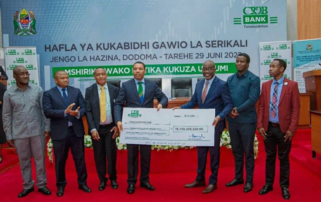 Jesper Kammersgaard 🇩🇰 (@dkambtanzania) on Twitter photo Happy to see Minister for Finance and Planning Hon <a href="/mwigulunchemba1/">Mwigulu Nchemba, PhD</a> receiving TZS 19.7 bn from <a href="/crdbbankPlc/">CRDB Bank PLC</a> on behalf of Danida Investment Fund 👉 our dividend for 2021. The funds will go to the health basket in support of the health of all Tanzanians🇹🇿 #ThamaniEndelevu Happy to see Minister for Finance and Planning Hon <a href="/mwigulunchemba1/">Mwigulu Nchemba, PhD</a> receiving TZS 19.7 bn from <a href="/crdbbankPlc/">CRDB Bank PLC</a> on behalf of Danida Investment Fund 👉 our dividend for 2021. The funds will go to the health basket in support of the health of all Tanzanians🇹🇿 #ThamaniEndelevu