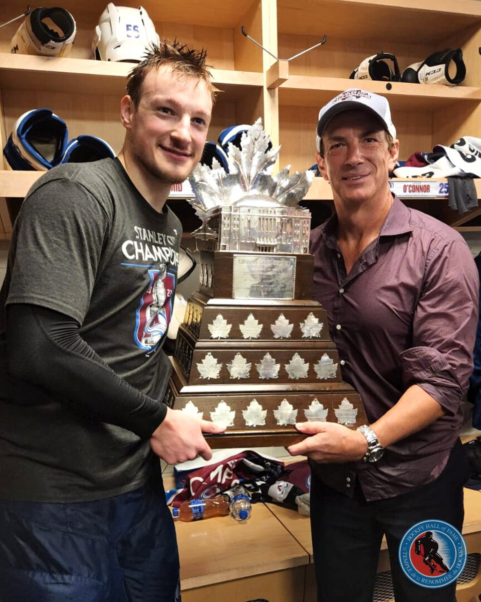 HockeyHallFame's tweet photo. Passing the MVP torch 🏆 

How cool is this photo of 2021-22 Conn Smythe Trophy winner Cale Makar with his GM and 1995-96 winner Joe Sakic?! 

@Avalanche | 📸 Phil Pritchard/HHOF https://t.co/Eh9LekRbxw