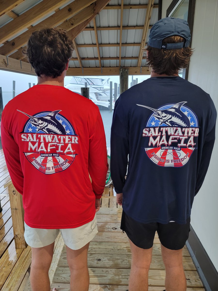 ReelSurprise's tweet photo. Just in time for the holiday weekend! Two of our AWESOME dockhands, Brayden and Preston, modeling new shirts from Saltwater Mafia. Stop by our #DockStore to pick up yours. #weloveourstaff #bestplacetowork #reserveyourcharter #orangebeachfishing #orangebeachcharters https://t.co/YArBym9HWJ