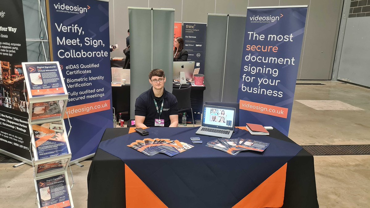 VideosignLtd's tweet photo. The Videosign team are all set up for the Merseyside Expo 2022 - are you going along today? Then don't forget to say hello to Peter (pictured) and Jamie to find out more about secure document signing #MBExpo2022 #remotesigning #electronicsignatures https://t.co/dv4S0fEggq https://t.co/bYp44LO49G