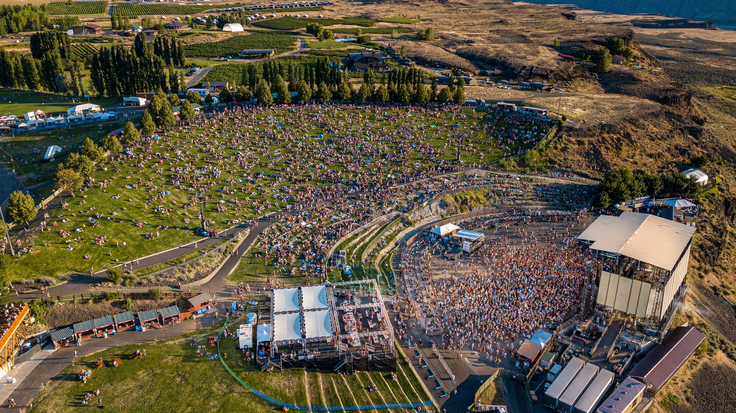 An overhead perspective of a an amphitheater full of people.