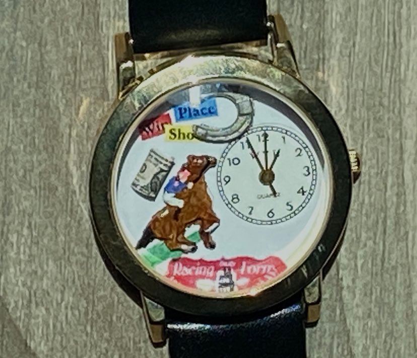 DRFLivingston's tweet photo. Just found this old watch....sooooo great! 3-D, including the little rolled up 'money.'
#DRF #ItsPostTimeSomewhere
@DailyRacingForm https://t.co/helm65qMws