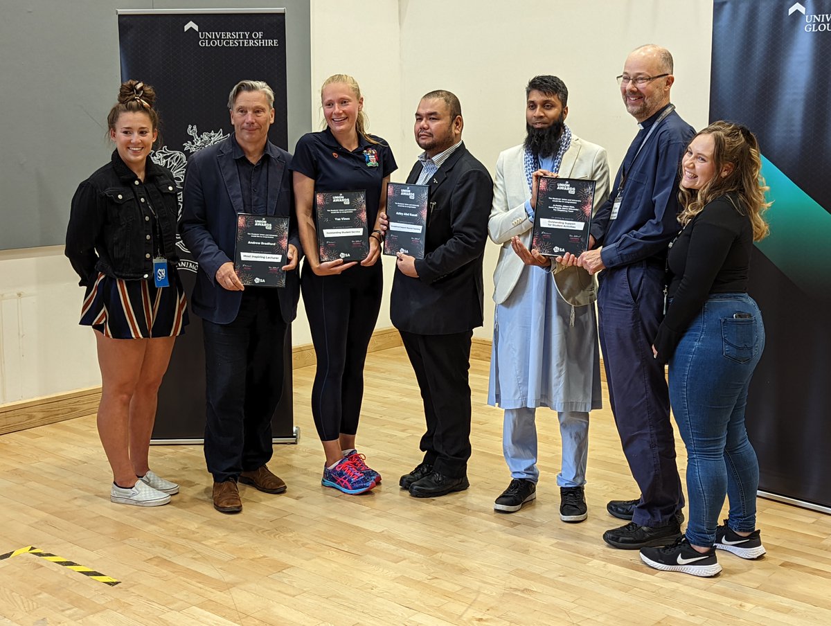 HE_MPA's tweet photo. It's been a day to say thank you with multiple and wonderful celebrations, with both the @uniofglos Staff Awards and a farewell to the outgoing officers of @uogstudentunion. This picture combines the two: the recipients of the Student-led Staff Awards flanked by our SU officers. https://t.co/6C7wUj2IDz