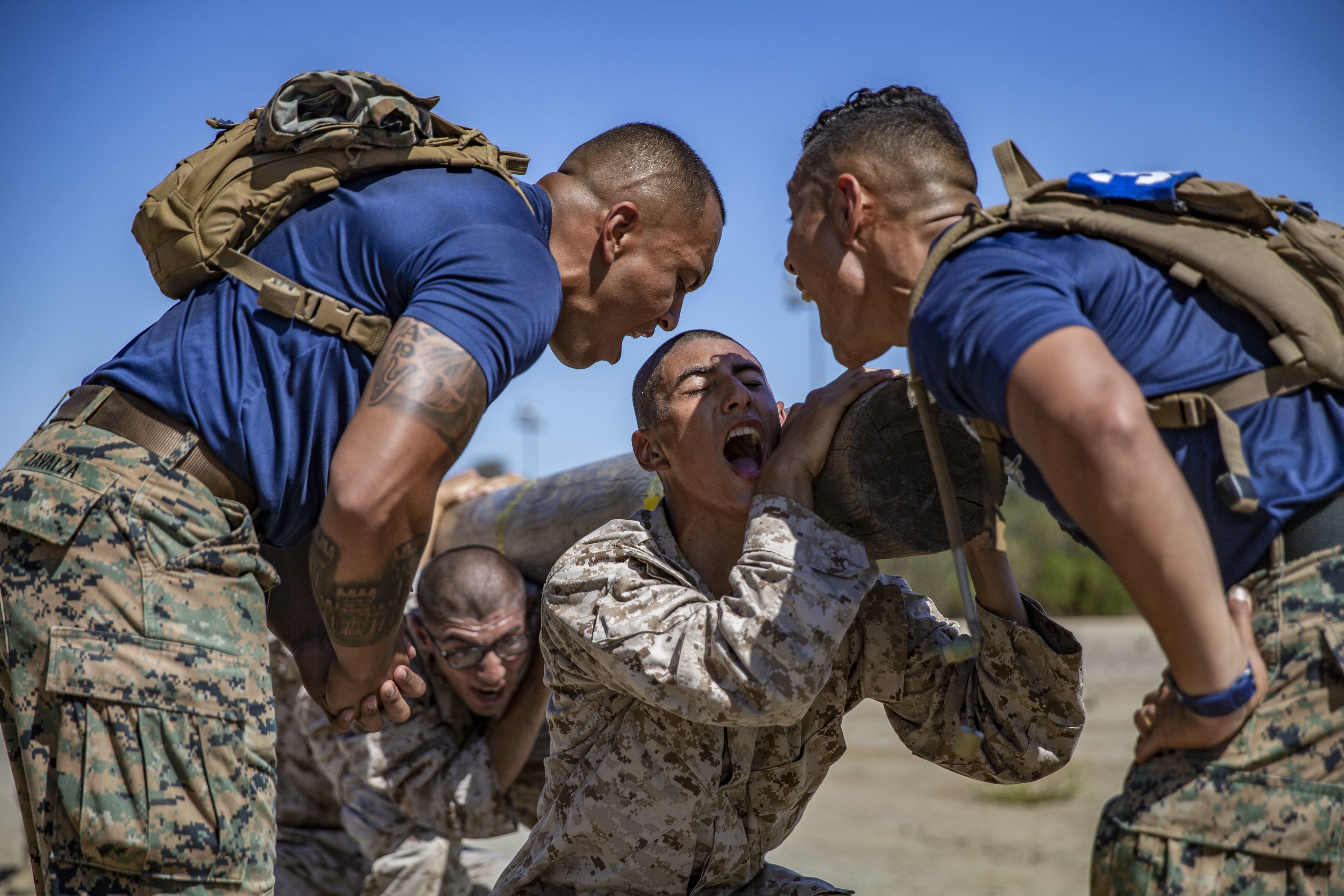 A recruit from Mike Company, 3rd Recruit Training Battalion, applies a choke  hold during a Marine Corps Martial Arts Program test at Marine Corps  Recruit Depot San Diego, July 20. The recruits