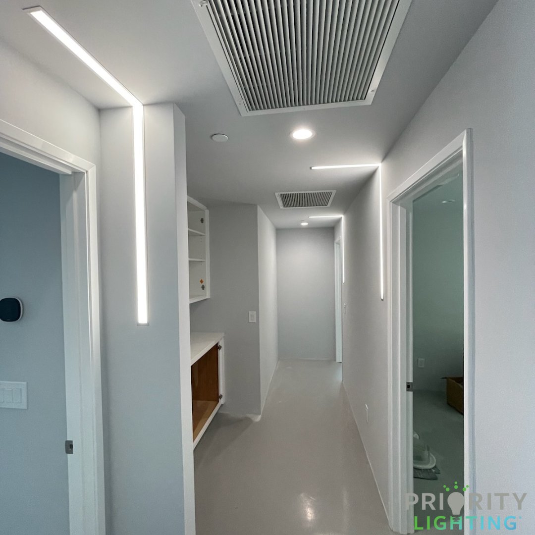 Priority Lighting supplied and designed these cool, modern  LED linear surface lights in this newly constructed home.   They were uniquely placed in order to showcase the fireplace &amp; give added interest in the doorways and hallway - design finally meets functionality!

#ledlights