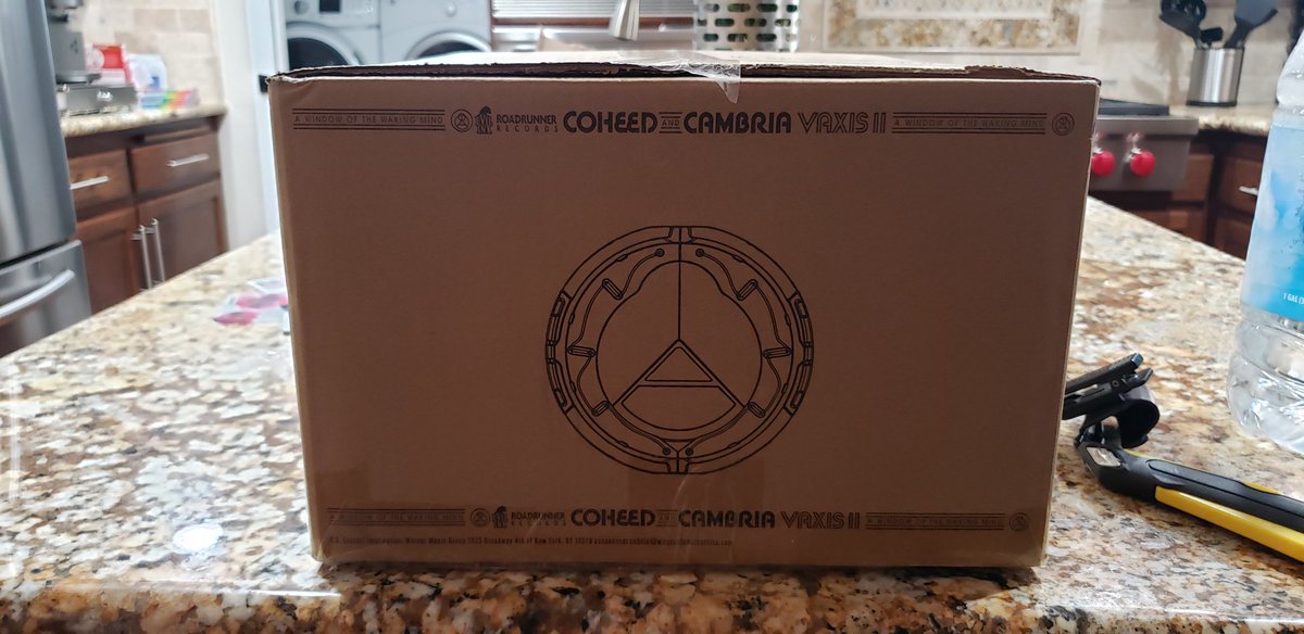 Pixel_Grip94's tweet photo. I swear to God, @Coheed are trying to make hoarders out of us. I was planning on keeping the box anyway guys. You really didn't have to go so hard...that being said, this box is fucking beautiful. I'm even trying to take the tape off without damaging it. #Vaxis2 #AWOTWM https://t.co/qFYQwcwsoQ