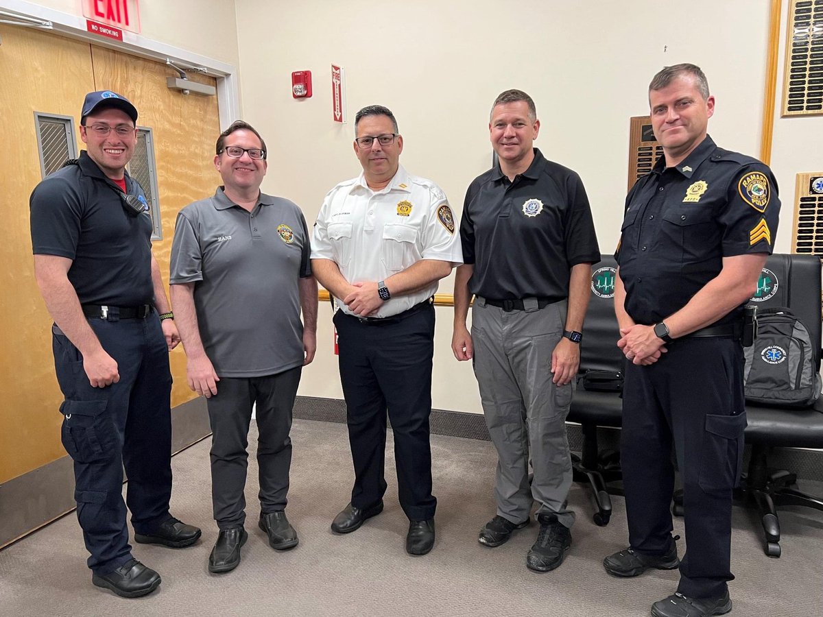 Ramapo_PD's tweet photo. Sgt Rob Bassett, Dr Jeff Rabrich & Paramedic Josh Hans of @townoframapo O.E.P. taught a lesson on Rescue Task Force @SpringHillEMS training meeting. We thank Spring Hill for inviting us to conduct this training class & we appreciate the partnership. #wetraintogether https://t.co/szMpPW6qjL