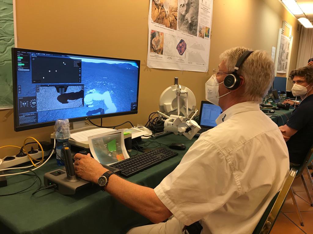 esaoperations's tweet photo. ESA astronaut Thomas Reiter has been controlling the Interact rover on #MountEtna as if from the future lunar #Gateway in #Moon orbit (actually #Catania), while a science team in an adjacent room offered advice on which samples to grab
#ARCHES22 #RobotsOnEtna #Analog1 https://t.co/Ioh5Kbzris