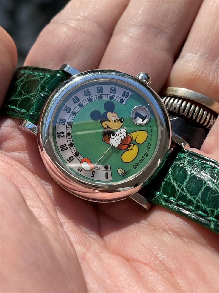 vwcweb on X Gerald Genta 1990s Automatic Retro Disney ref.G3612 MOP Green dial. Jump hour with retrograde minutes. Stainless steel case number 76835 swiss made signed secured by 6 screws. Original