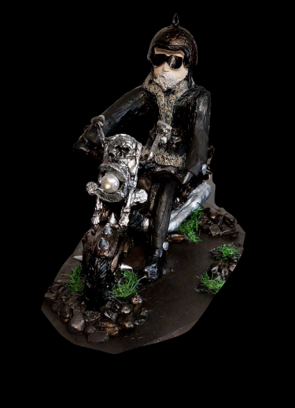 SarahMasonMusi1's tweet photo. Biker on motorbike clay sculpture https://t.co/kc7OkYkOVB