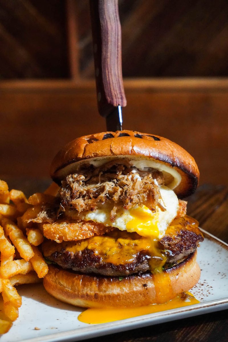 At MAD we put a twist on classic American fare. So to kick off your long holiday weekend in the good ol' USA, start with brunch &amp; don't skip out on the MAD Brunch Burger loaded with a fried egg &amp; hash browns that melt in your mouth! 🍔🍳🥂