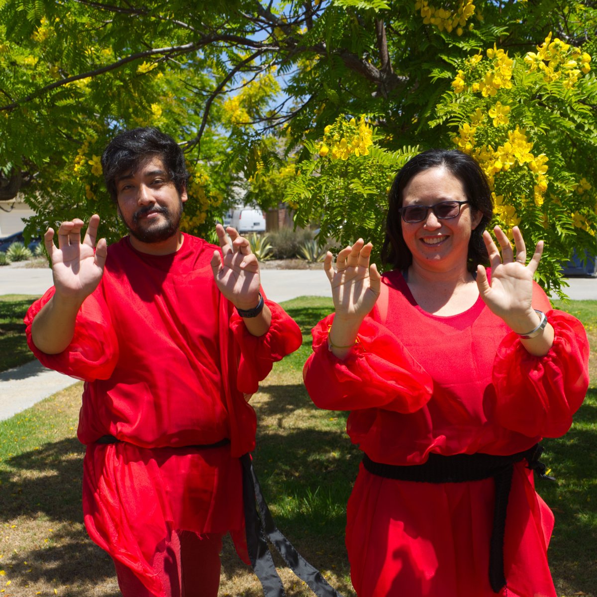 SDPublicLibrary's tweet photo. It's happening. Staff are donning their red dresses and getting ready for #TheMostWutheringHeightsDayEver happening at #PacificBeachLibrary! Don't miss out on this epic #KateBush x Cathy -inspired dance mob! https://t.co/a5IKAUxq7h https://t.co/Vj101Zxc1p