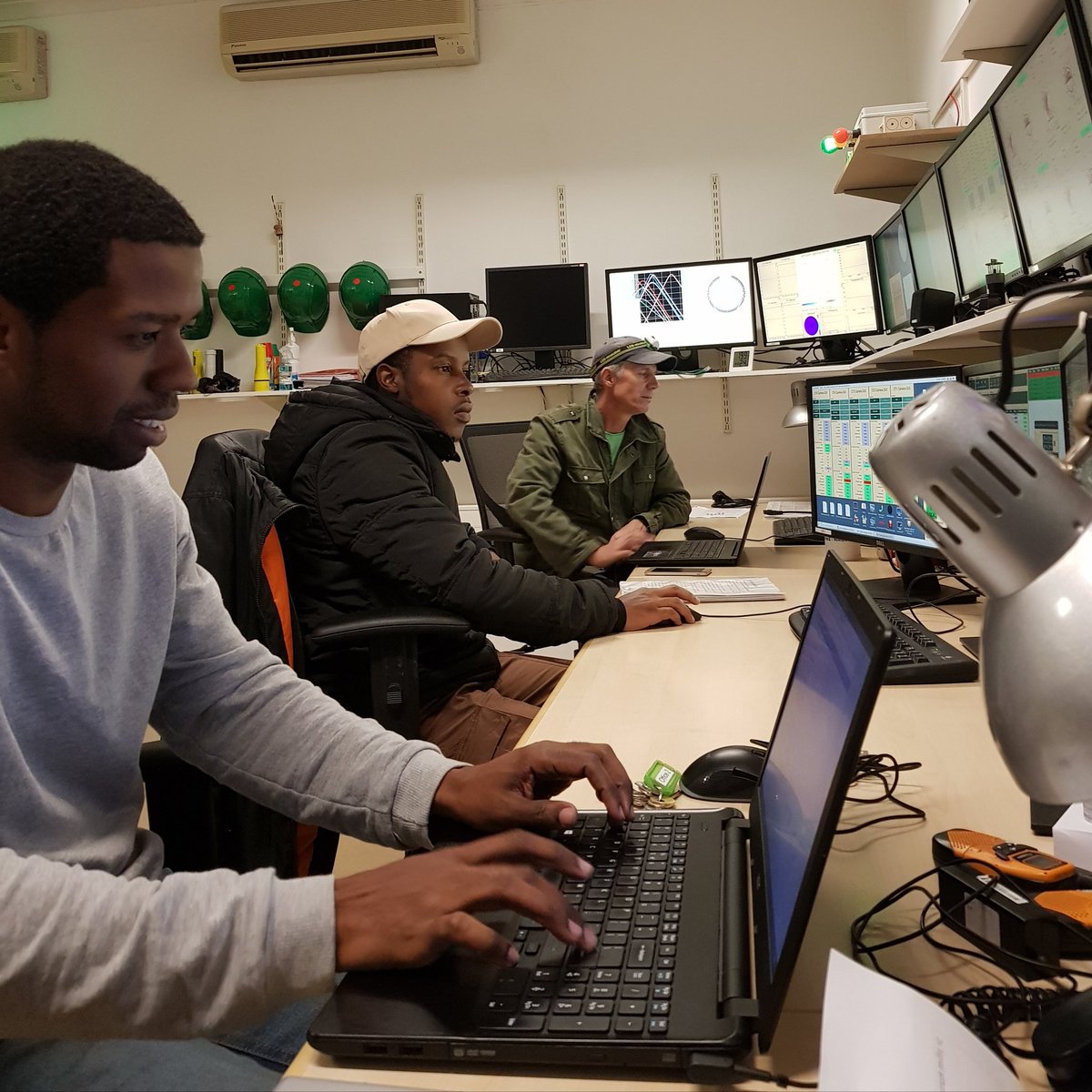 Every observing night, two or three shifters oversee the array operations: preparing the cameras, scheduling the observations, keeping an eye on the weather conditions, etc.

Up tonight are Hiiko (center) and Kai (right), with support from Sennae (left).