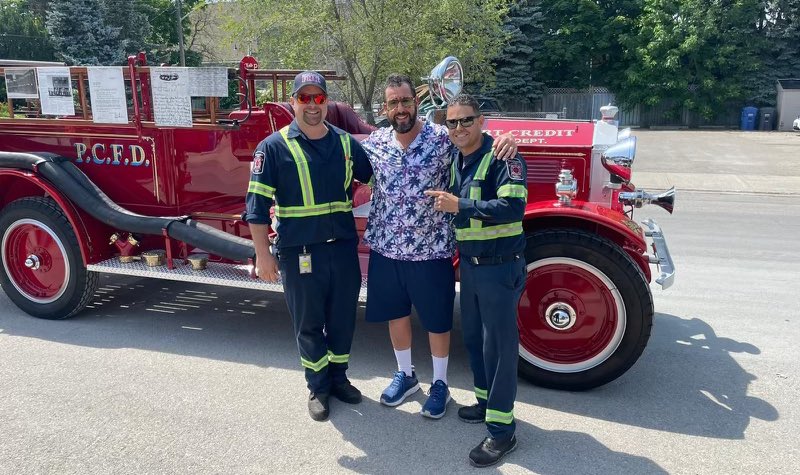 derynrizzi's tweet photo. It’s hard to say which one is cooler 😎… Adam Sandler or our Bickle fire truck 🚒 https://t.co/58E4tIe2wV