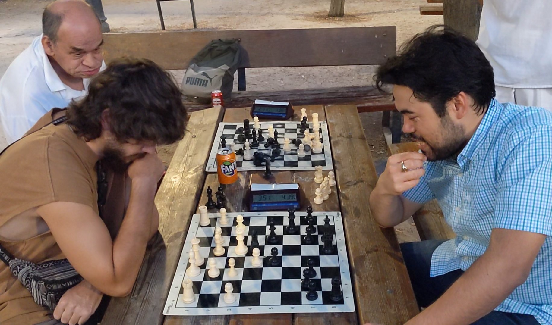 Messi and ronaldo playing chess - Playground