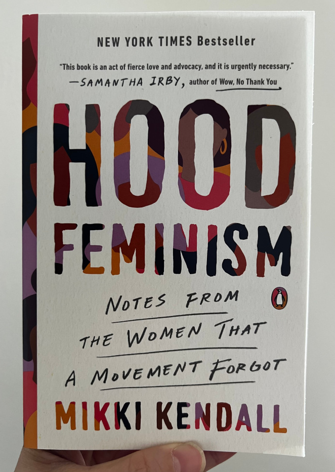 Hood Feminism: Notes from the Women That a Movement Forgot by Mikki Kendall.    The cover features an abstract illustration of Black women showing through the letters of the title and the author's name.
