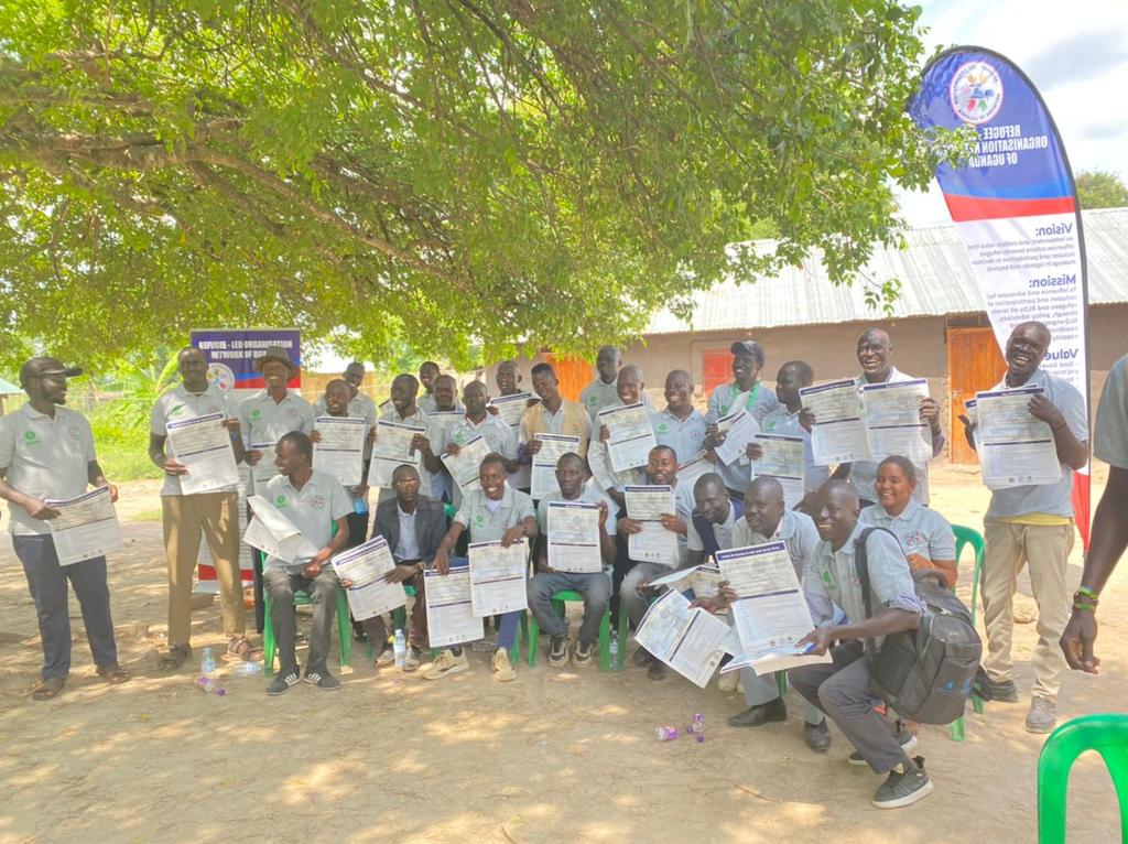 relonuganda's tweet photo. COVID-19 vaccine is safe and saves lives. Take your jab today by visiting your nearest health facilities. Relon Vaccine campaign #ambassadors in #Rhino, #Imvepi, #Kiryandongo, & #Bidibidi refugee resettlements. #FightCovid19Together. Thanks @OxfamAustralia for the support. https://t.co/YajpHRdE0n