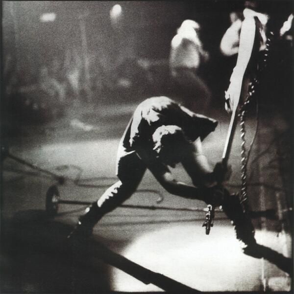 Paul Simonon from The Clash smashing his Fender Precision Bass against the stage at The Palladium in New York. 1979.