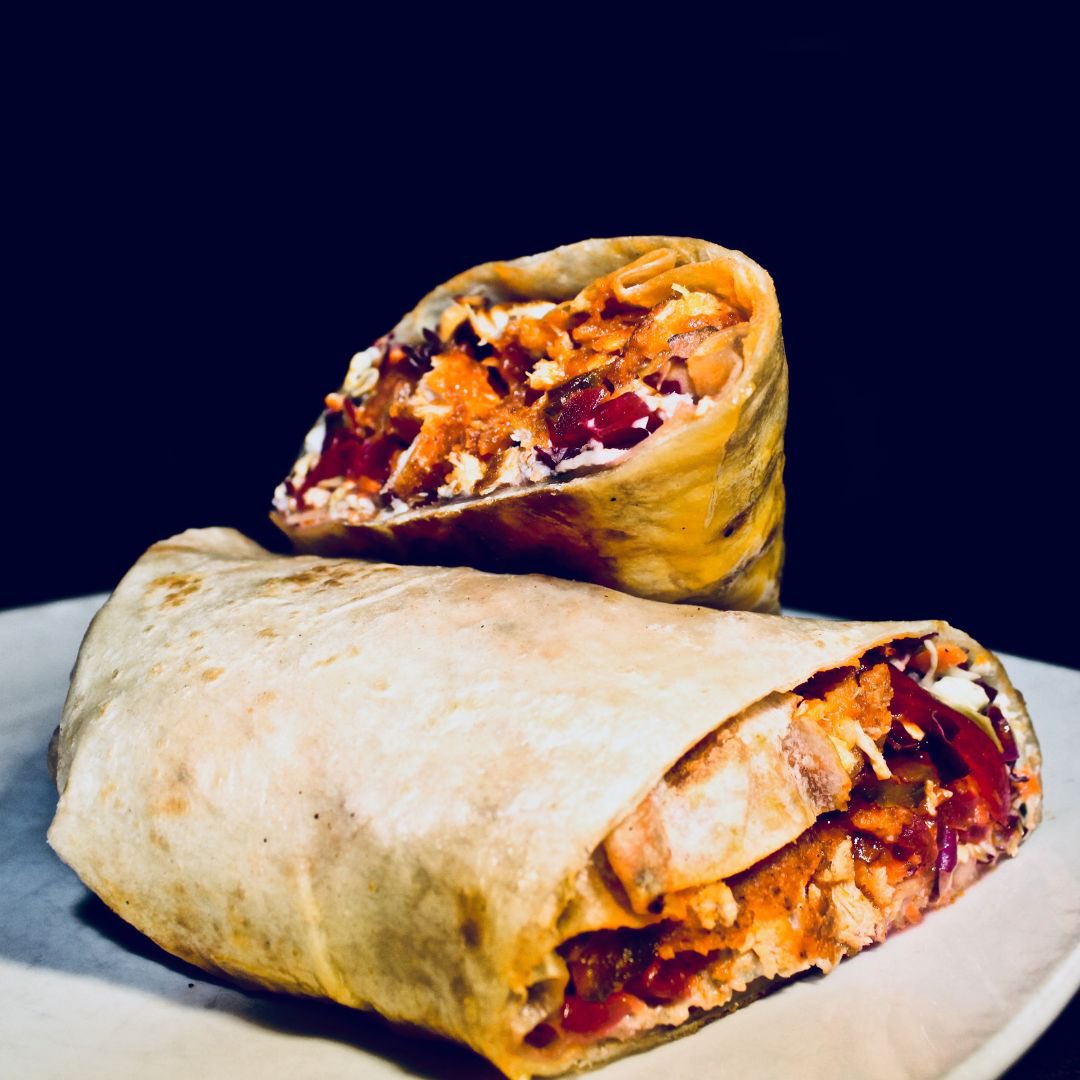 Have you tried our Buffalo Chicken Wrap? Fried chicken tossed in buffalo sauce, with blue cheese, slaw, beet pickled onions, and sweet pickles. Wrapped in a toasted tortilla. Served with fries or sweet potato fries. Come see us we open at 1pm. #thegrafton #lincolnsquarechicago