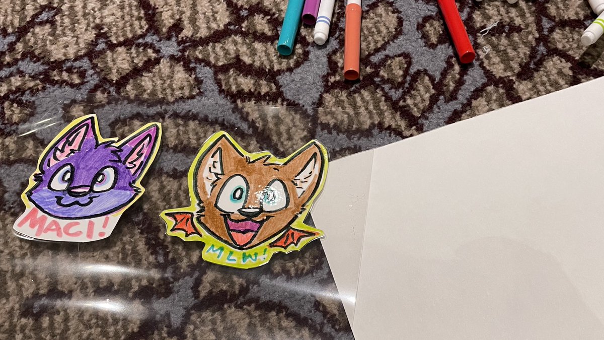 Badge workshop! Want a dumb lil badge? Come find me 😋 #Anthrocon2022