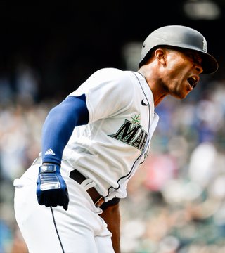 Justin Upton celebrates after a game-tying solo homer. 