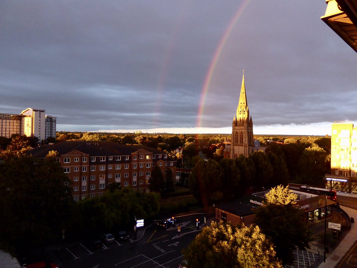 Some weird light this evening at sunset, has it was pouring with rain and an evening rainbow.