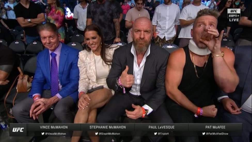 BGMarkSlayers's tweet photo. This just in: Vince Steph Game and PM at the UFC show giving 0 F’s what the Marks thought of running the same night! #trolllevel1000 #UFC278 #WWEMoneyInTheBank https://t.co/rfeRYotApg