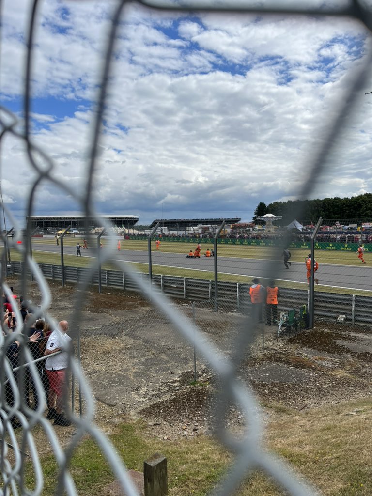 Protestors on the track at the #BritishGP. They stormed the fence on the first lap.