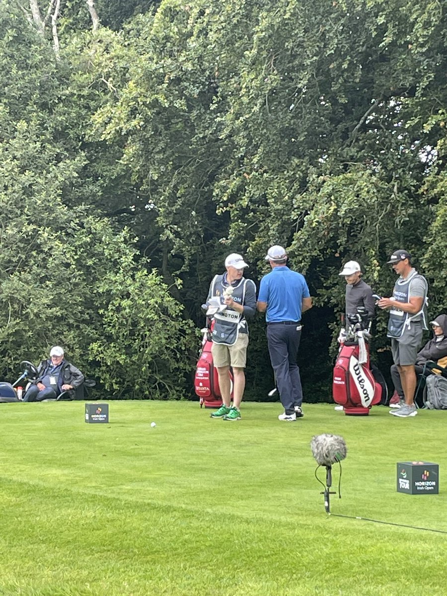 fkirwan's tweet photo. Ronan Flood going above and beyond with his caddying duties for @padraig_h minding his ice cream for tee off on the 15th at the @IrishOpen_ #HorizonIrishOpen #golf #caddylife https://t.co/SminGoQZQH