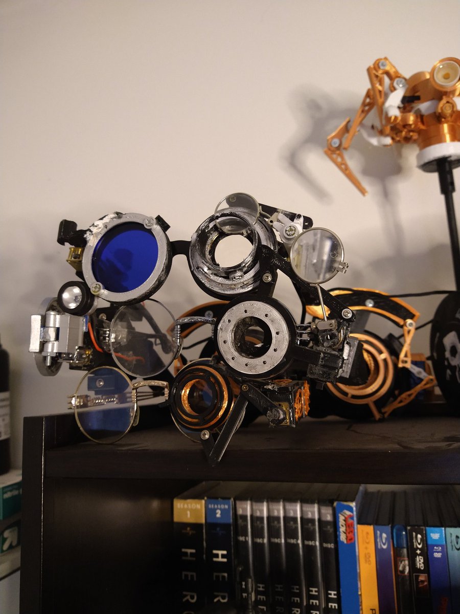Odd_Jayy's tweet photo. Good morning, thought I take a pic of the level up from my first pair of custom glasses to the most recent. It's always fun to revisit an idea and make upgrades. #maker #wearble https://t.co/hJXETUc27c