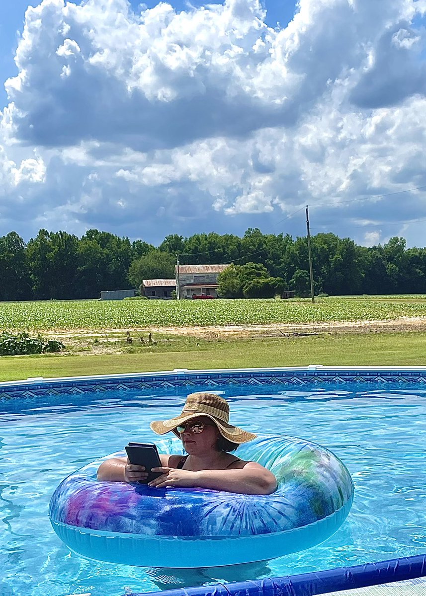 Pool + book + float = my happy place 📚🌊☀️