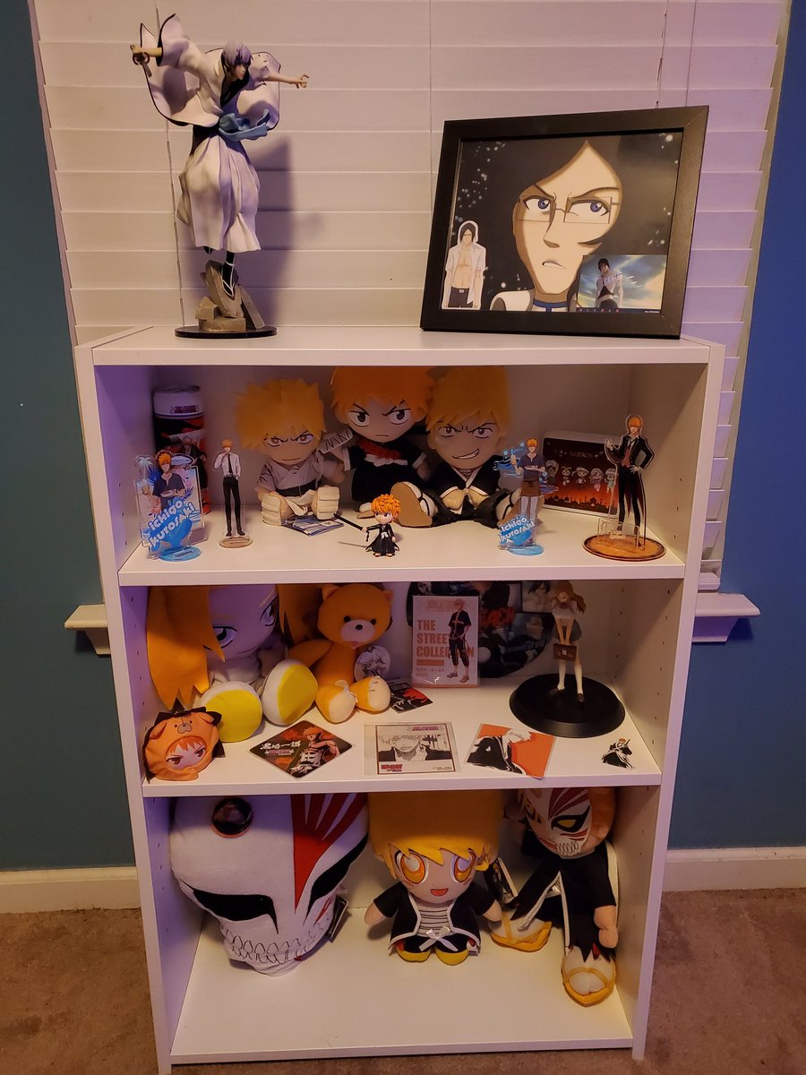 Mellizard's tweet photo. It really took all day, but finally rearranged and dusted. Now I have an Ichigo shelf...never thought that would happen. Like ever.  (Yes. I know it's backwards to put Ichigo on the white and not Quincy boy, but Uryu needs more room!)  More pics in comments 💙 #Bleach #exhausted https://t.co/0zppy1P2DX