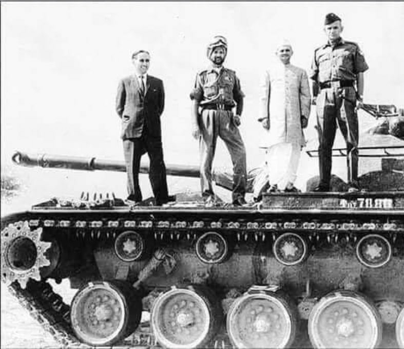 VShastri_'s tweet photo. A rare photograph of Former PM Late Lal bahadur shastri ji on top of a captured Pakistani Tank after 1965 victory against Pakistan. https://t.co/knLl8VfAxb