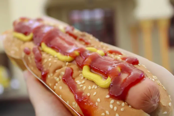 Reductress's tweet photo. Woman Frees Hot Dog of All Innuendo by Eating It Like Corn on the Cob: https://t.co/WAYBBoUStV https://t.co/iMylaNRMmc