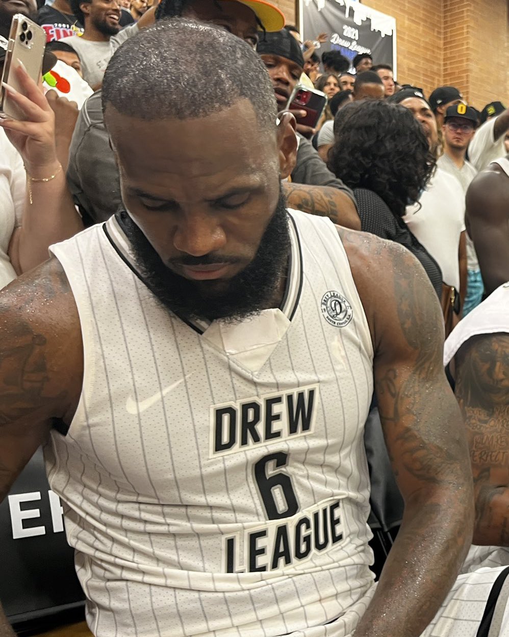 Complex Sneakers on X: .@KingJames taped over the Adidas logo on his Drew  League jersey 👀  / X