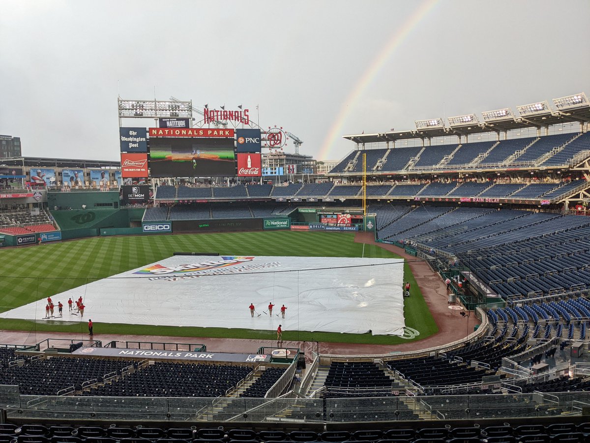 Rain delay winding down, rainbow appears over the tarp, sponsored by Skittles... hmm... @capitalweather @dougkammerer