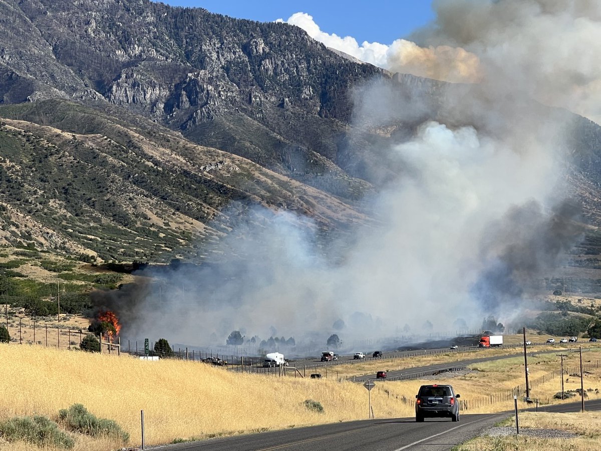 fox13's tweet photo. NEW WILDFIRE: The #PrecisionFire is burning just off I-15 a few miles south of Santaquin. Details: https://t.co/NagIoJLMBk

(Photos by Angella Garlick) https://t.co/Pf2I9AYniE