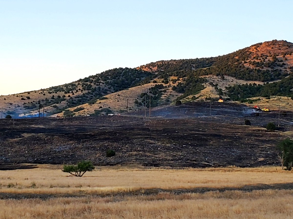 Firefighters working the #PrecisionFire are estimating the blaze has burned over 35 acres. Multiple local, state &amp; federal resources are working to secure containment lines tonight. All lanes of I-15 NB are open. Cause looks to be human but remains under investigation. #kmyffsl