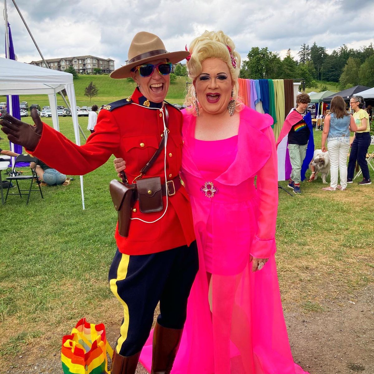 OutOnPatrol's tweet photo. Thanks to @FVPride and @MissionRCMP for inviting #OutOnPatrol to #MissionPride today! @BCRCMP S/Sgt and our board member @lrostie had a great time in her #RedSerge and 🌈 sunglasses. Great to see @Mission_BC mayor, councillors and assistant fire chief out today too! https://t.co/OLaLRyOZ6Z
